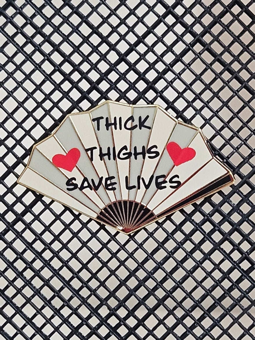 "Thick Thighs Save Lives" filler fan enamel pin
