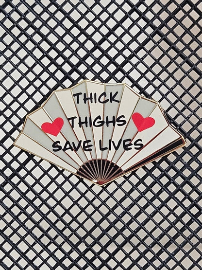 "Thick Thighs Save Lives" filler fan enamel pin